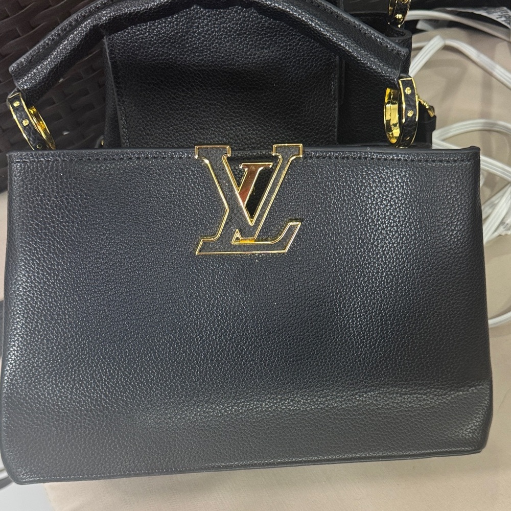 Louis Vuitton Black Satchel with Gold Accents